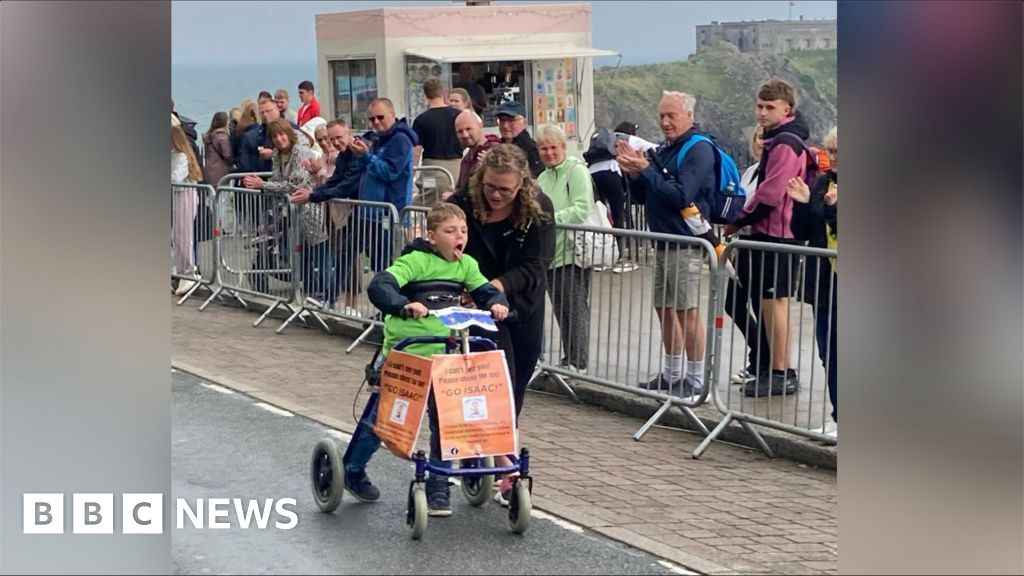 Eight-year-old Isaac Tilley tackles Ironkids Wales using his walker ...