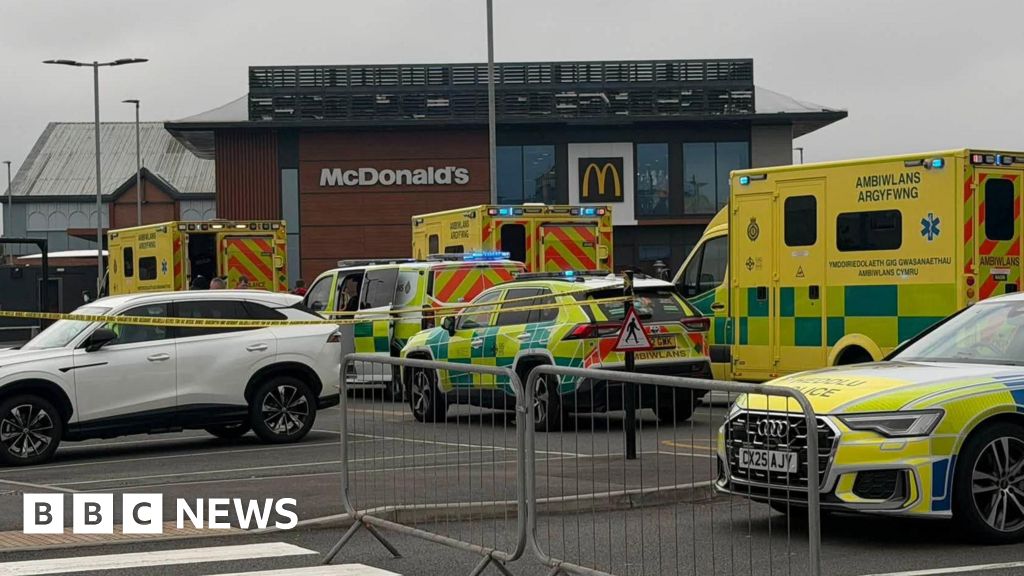 Five people taken to hospital after crash near McDonald's