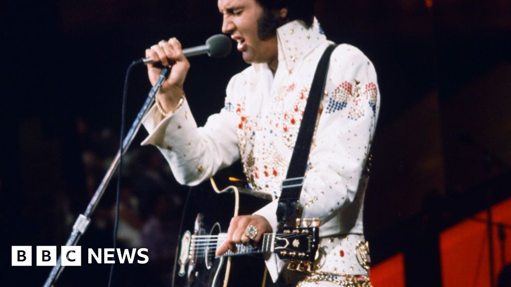 Blue suede shoes worn by Elvis sell for £120k