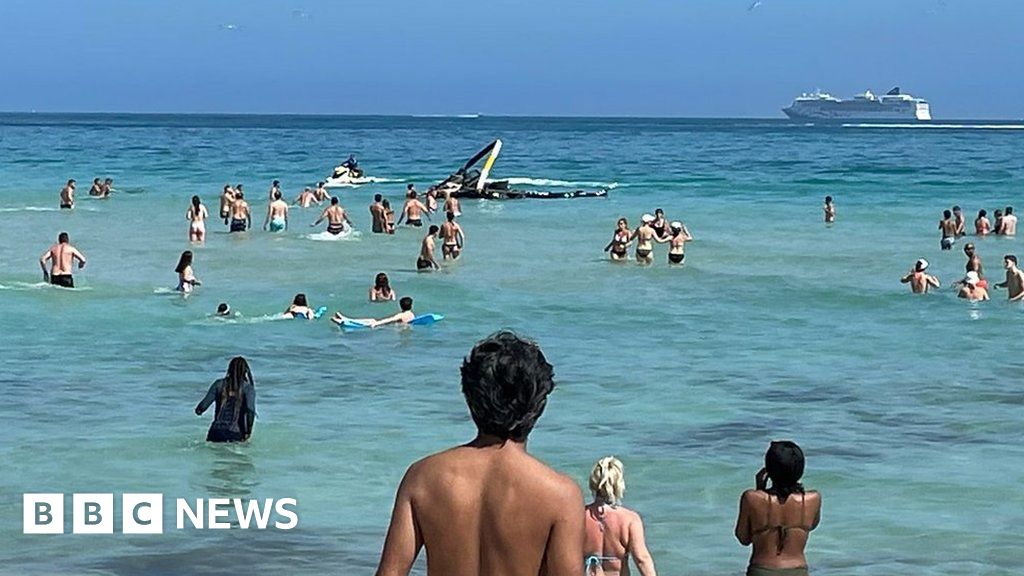 Helicopter crashes metres away from bathers in Miami