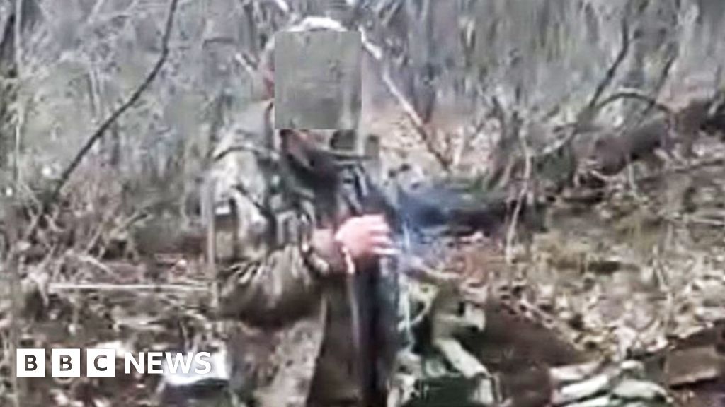Ukraine hunts Russian killers of unarmed smoking soldier