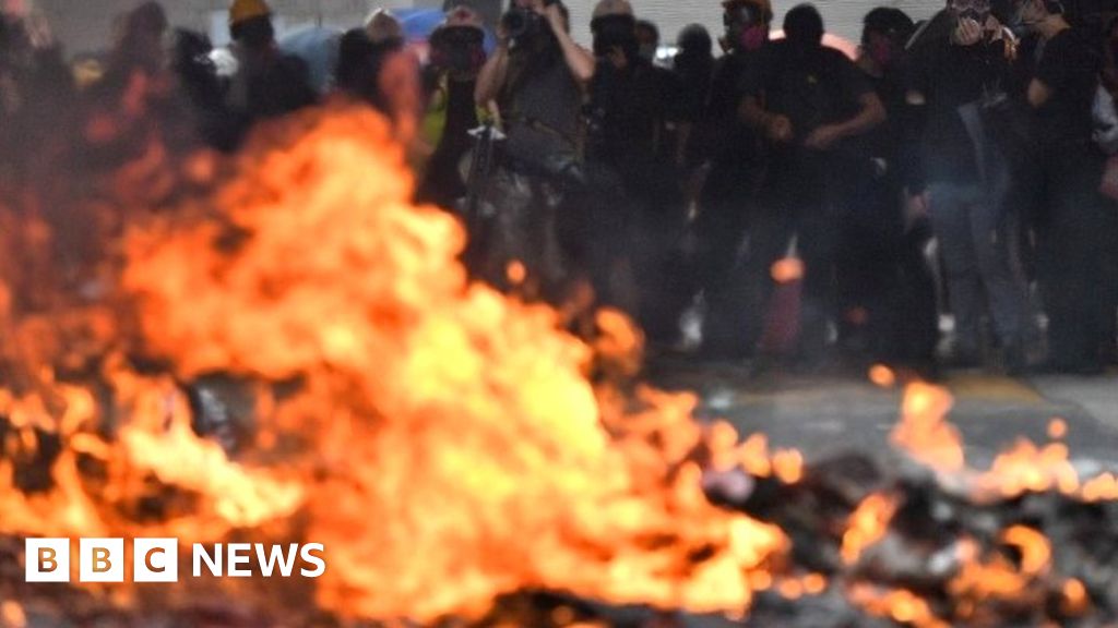 China anniversary: Clashes as Hong Kong protesters defy police ban