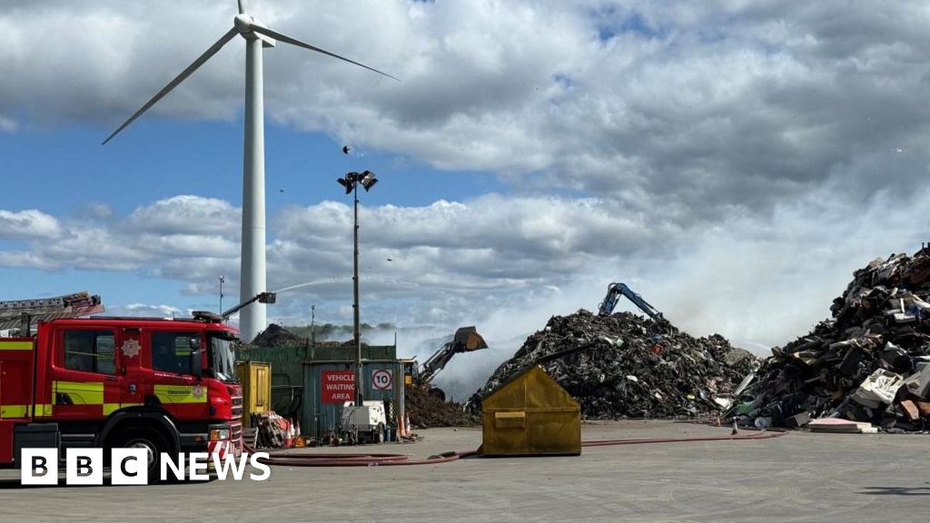 Landfill site workers 'climbed locked gate to escape blaze'