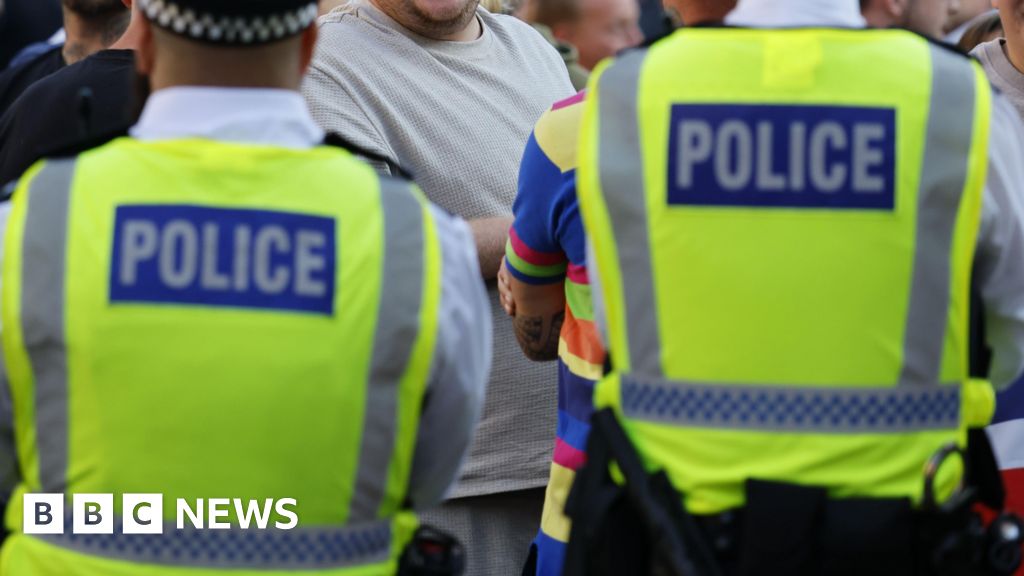 Five arrests after masked men tried to enter asylum hotel, police say