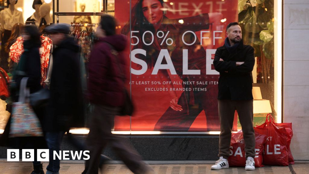 Next reports Christmas rush but warns of slowdown ahead