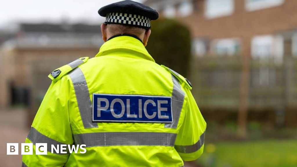 Arrest after policeman injured by car in Manchester