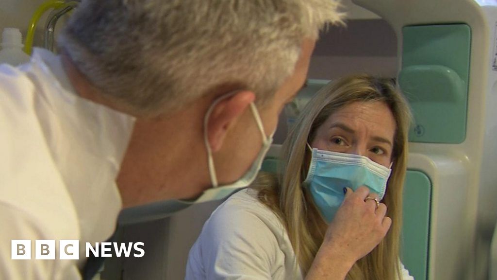 Mother of ill child grills health secretary on NHS plans