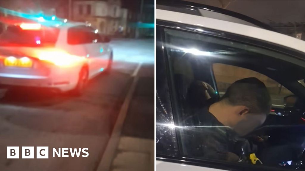 Staffordshire Police reviews video of officers asleep in car