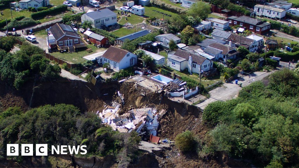 Coastal erosion Landslide leaves house hanging over cliff BBC News