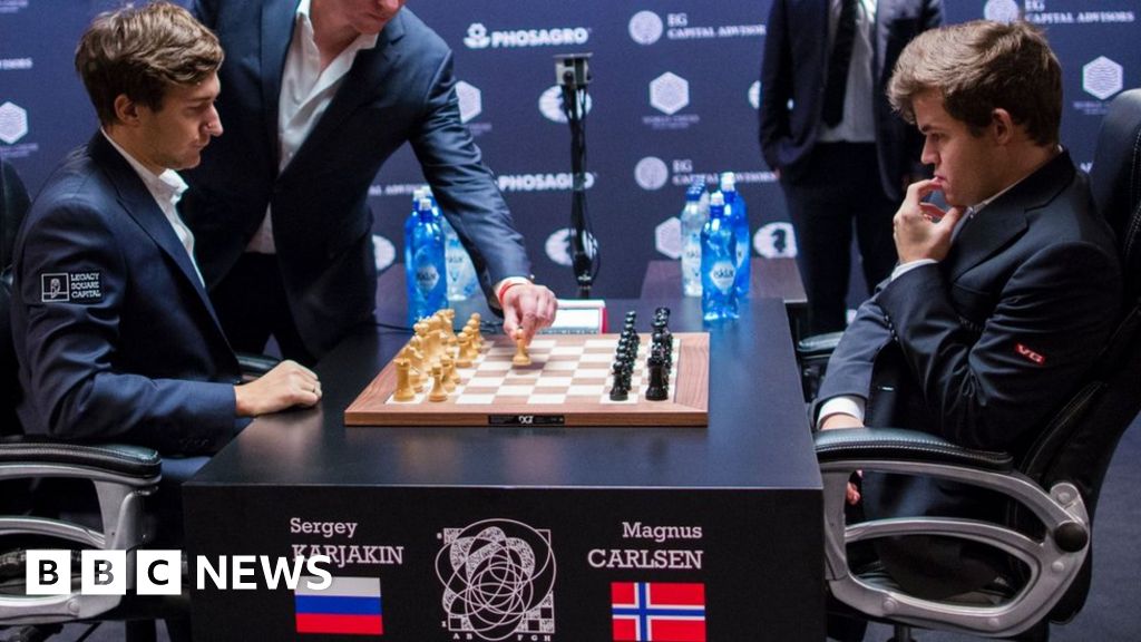 Carlsen wins third world chess title