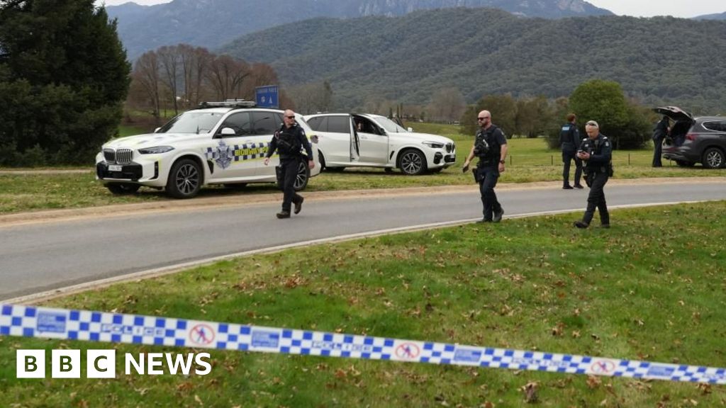 Manhunt under way after two police officers shot dead in rural Australian town