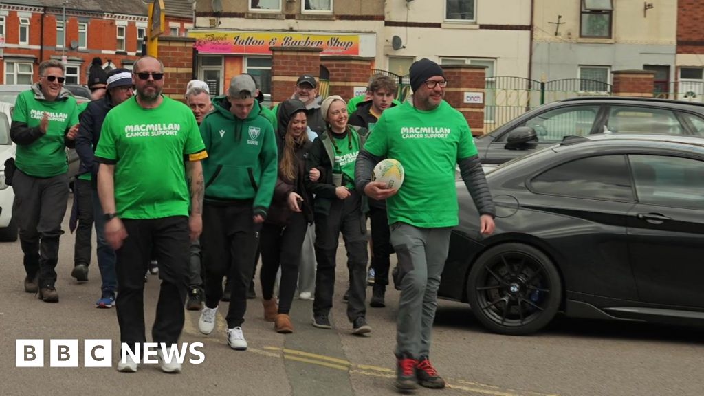 Friends deliver rugby match ball in overnight charity walk