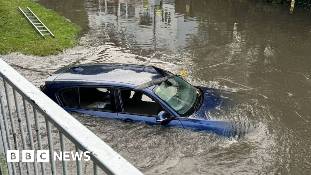 UK floods: Cars and railways under water as more rain forecast.