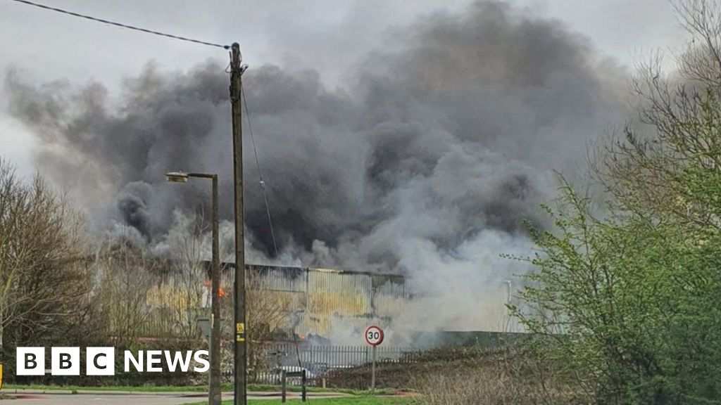 Wimblington industrial estate fire tackled by 50 crews - BBC News