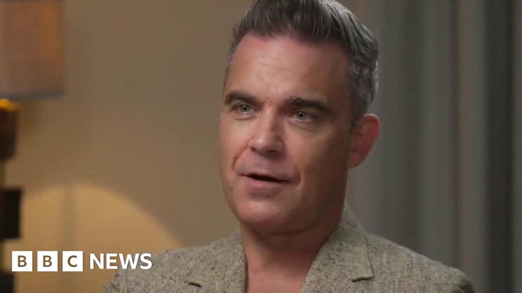 Robbie Williams on Glasto, kids and middle-aged spread