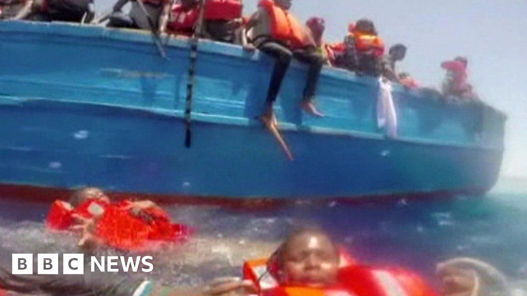 Child migrants rescued from the sea by Italian coastguard