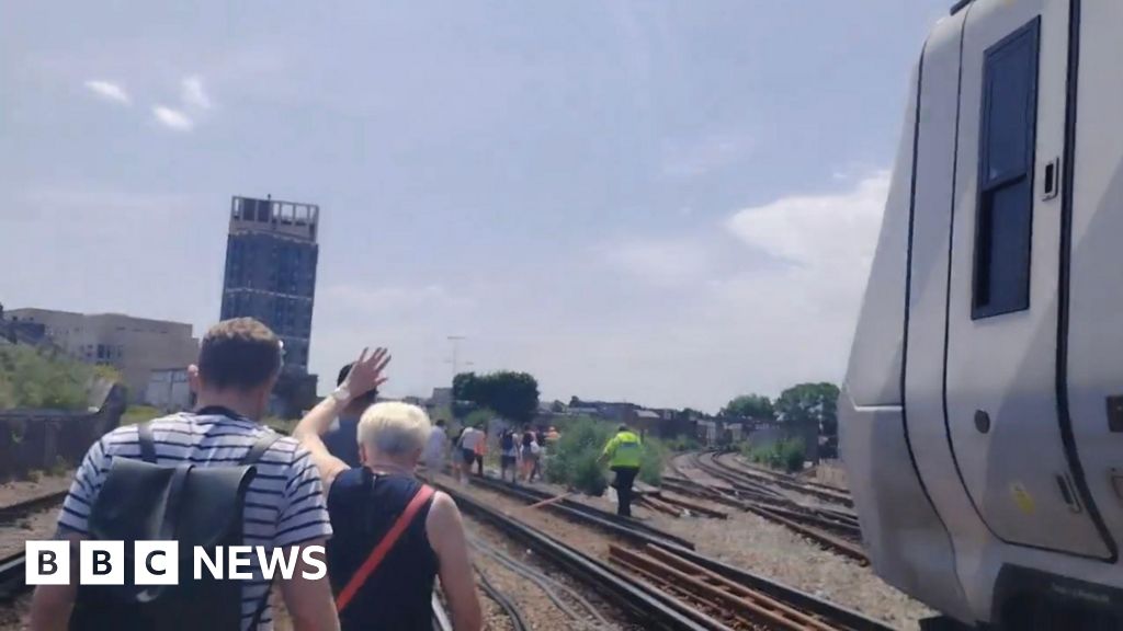 Train passengers evacuated as temperatures soar