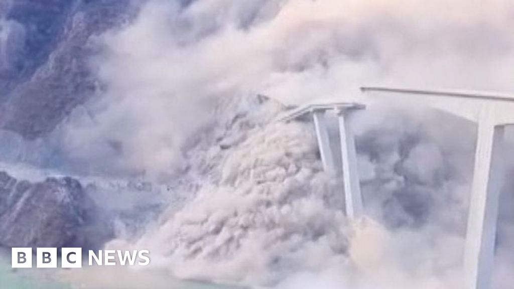 Moment newly opened bridge partially collapses in China