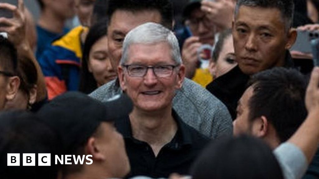 Apple boss Tim Cook makes surprise China visit