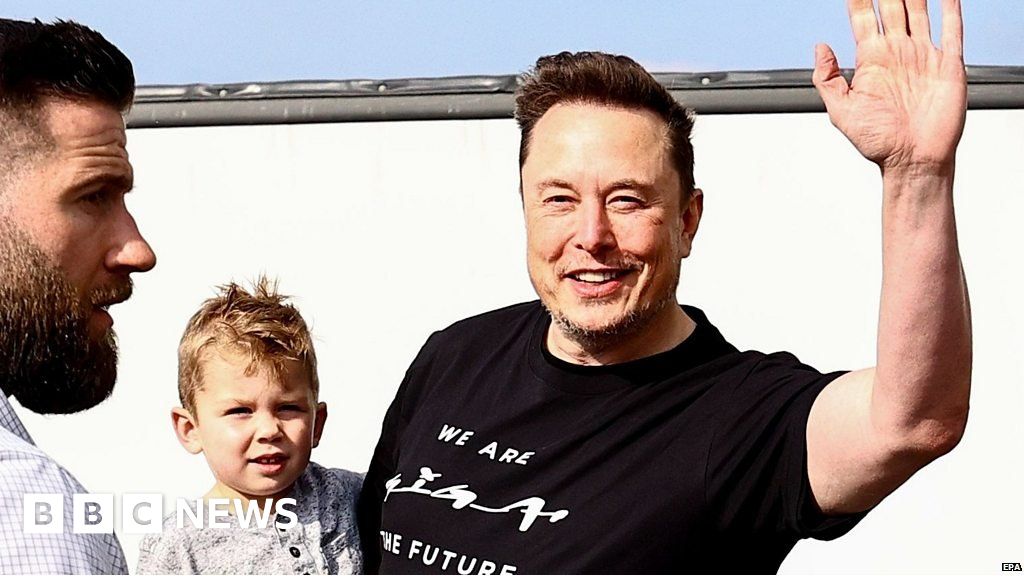 Elon Musk and Son Tour Berlin Tesla Plant After Pylon Fire