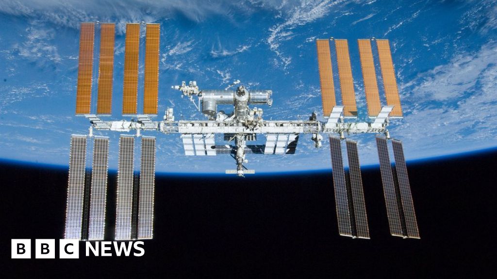 Space station crew woken up to hunt for air leak - BBC News