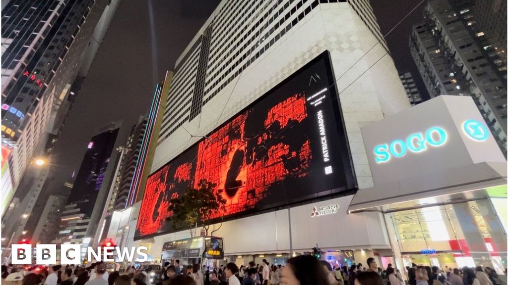 Hong Kong hidden protesters billboard artwork taken down