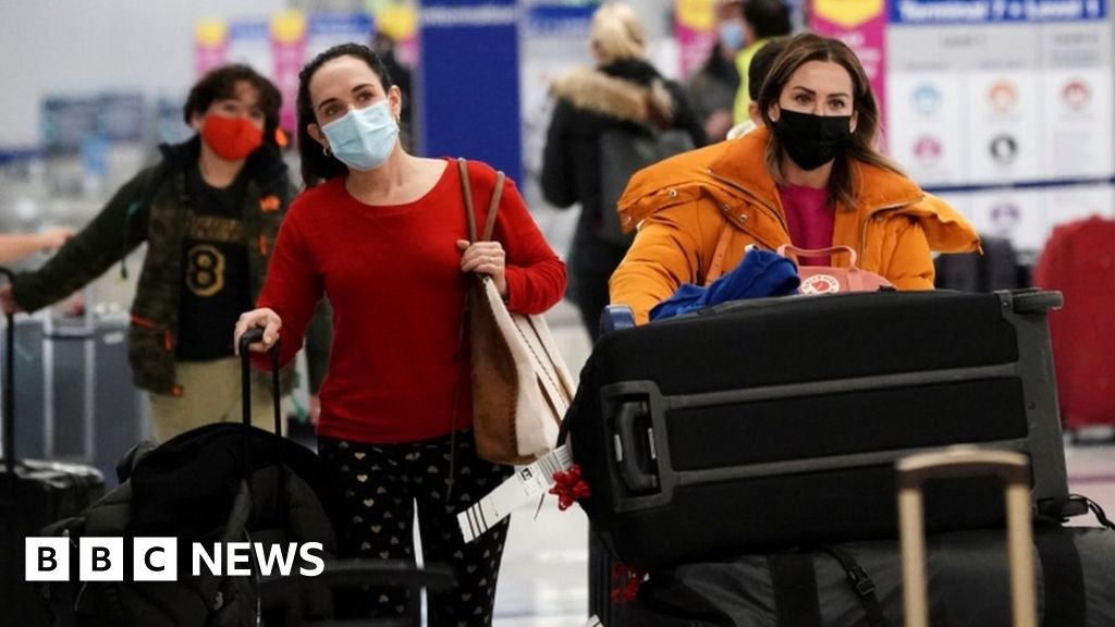 Covid: Christmas flights cancelled and new curbs amid Omicron spread - BBC News