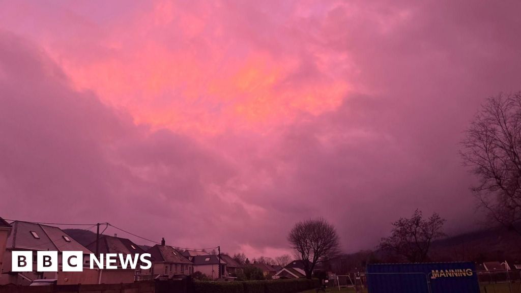 Pink rainbows light up the sky over England