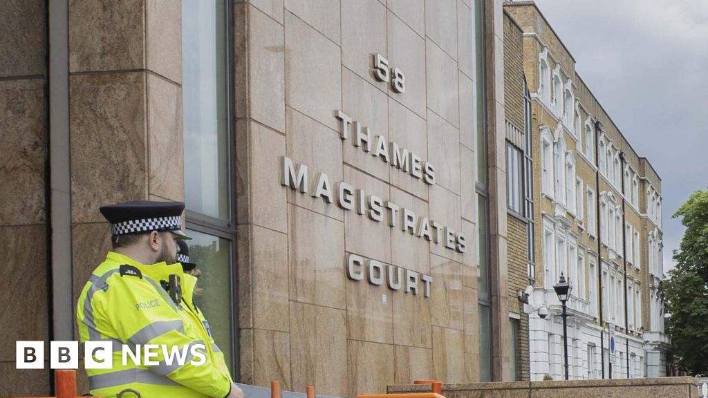 Met officer in court charged with stalking woman