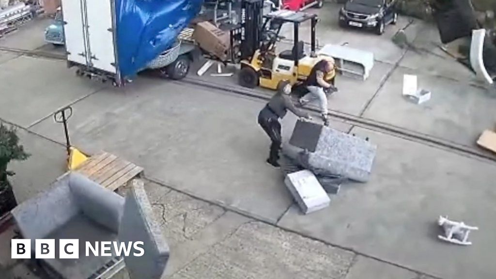 Watch: CCTV captures funnel cloud rip through storage yard