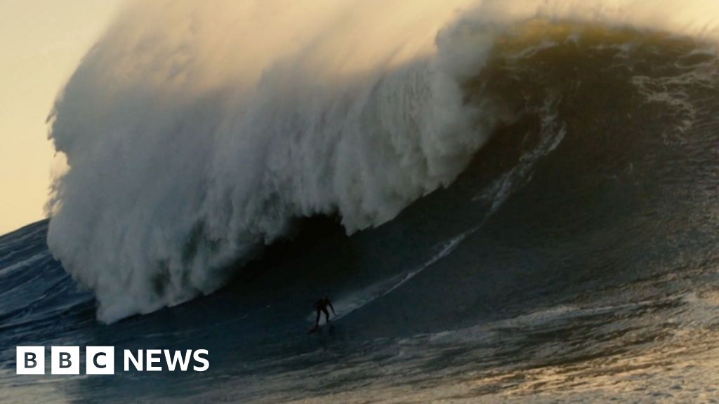 Watch: British woman surfs potentially record-breaking monster wave