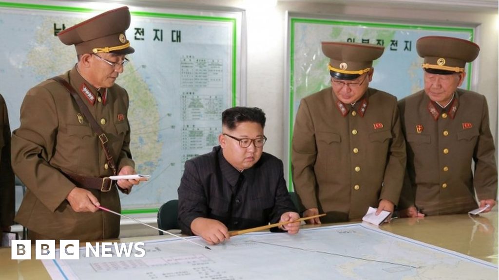N Korea leader 'briefed' on Guam plan but opts to wait