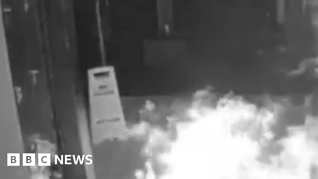 Gym reopens after suspected arson attack caught on CCTV - BBC News