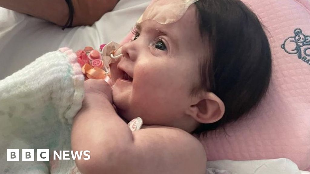 Poorly baby is bridesmaid at Bristol Children's Hospital ceremony
