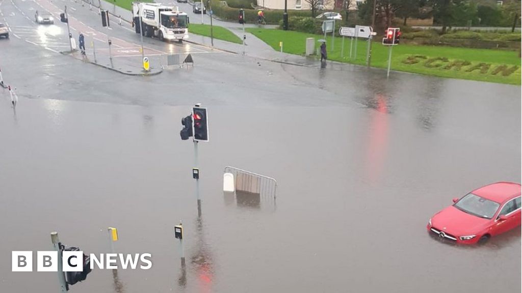 Roads and rail flooded after hours of heavy rain