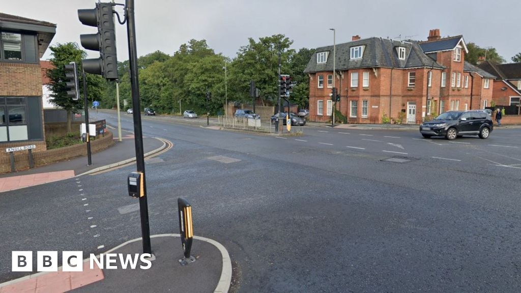 Camberley Road closed after man found seriously injured