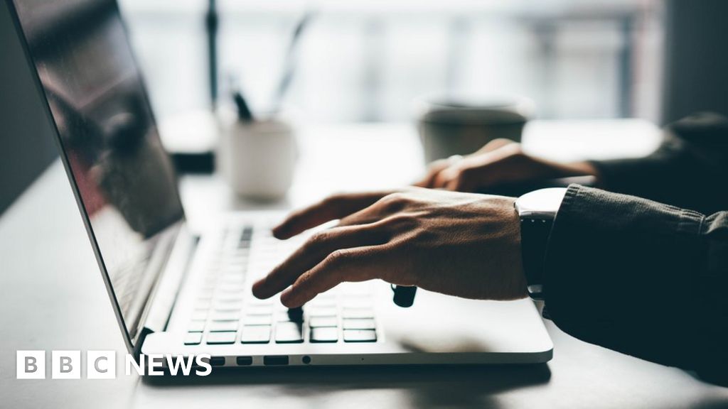 Man using laptop (stock image)