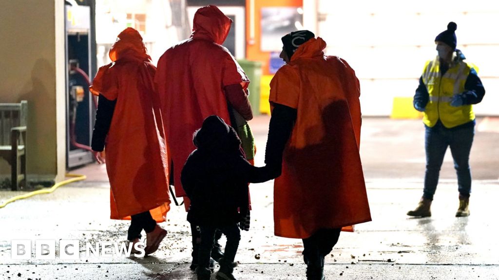 Where are asylum seekers being housed in hotels in the UK?