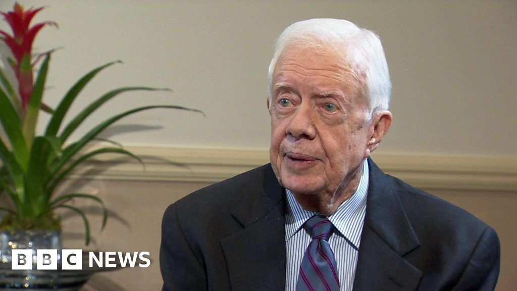 What disease is Jimmy Carter trying to eradicate?