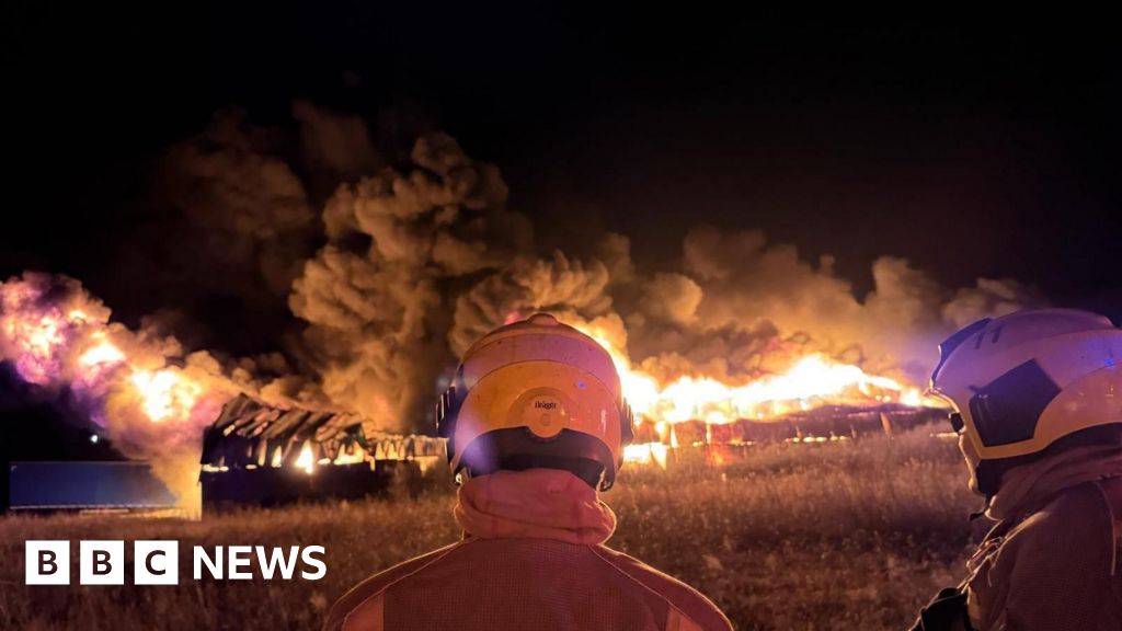 Fire at Desborough Airfield hangar burns through the night