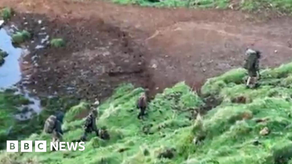 New Zealand refugee father seen in wilderness with children for first time in years