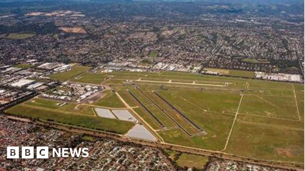 Two dead after small plane crashes into Australia airport hangar
