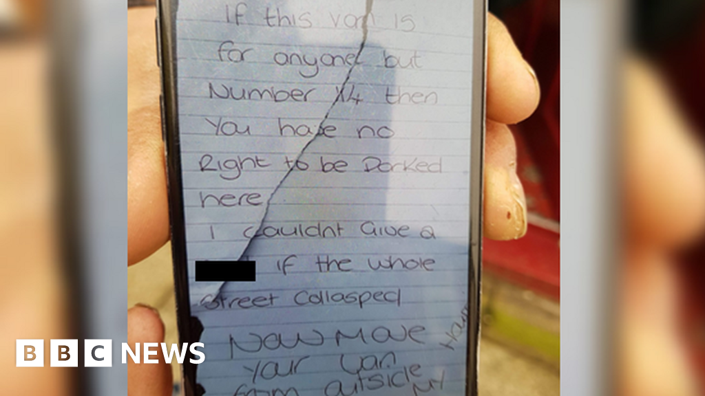 Woman arrested after 'move your van' note on ambulance