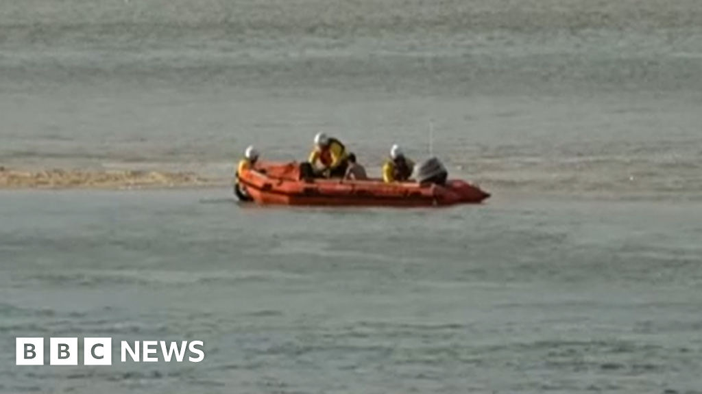 Boy's sea rescue captured on live TV report