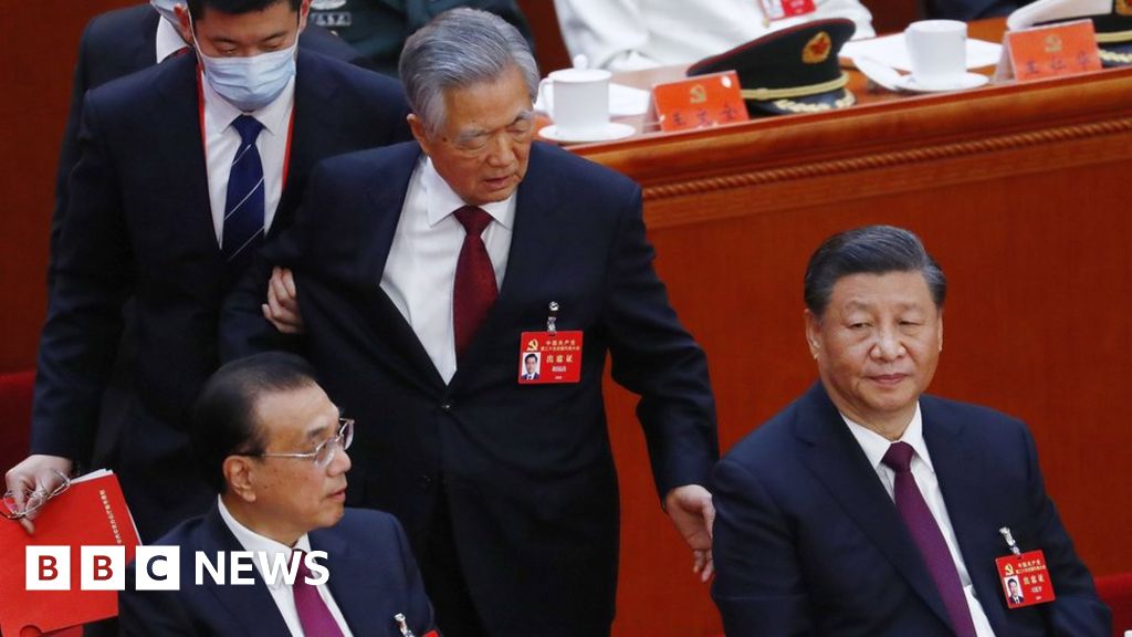Hu Jintao: ex-president escorted out of China party congress