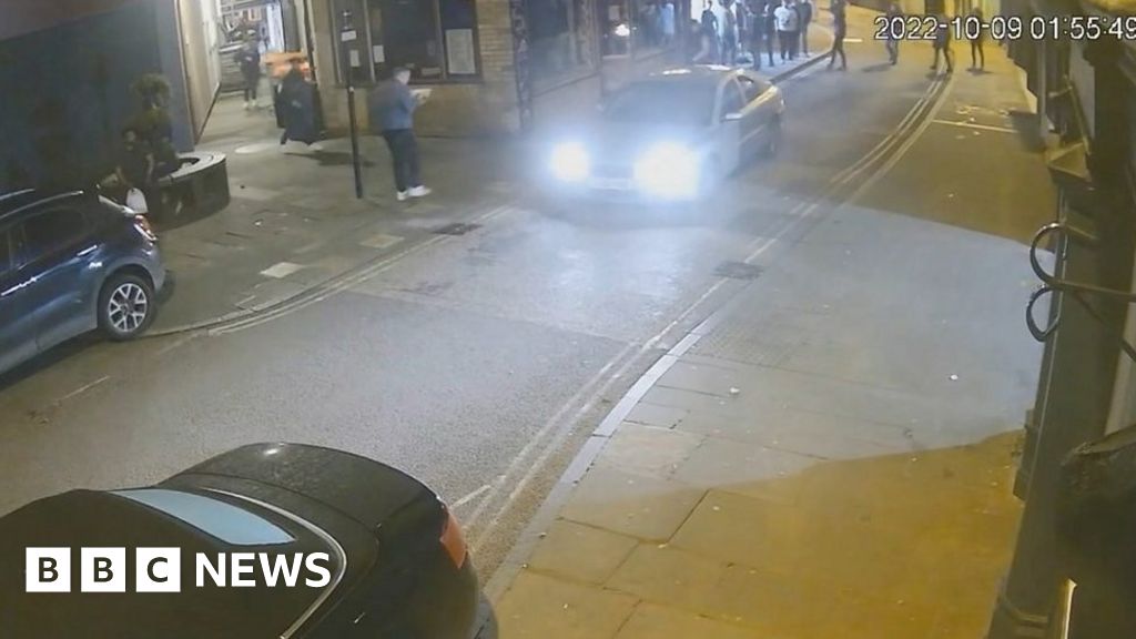 CCTV shows Oswestry driver hitting pedestrians on pavement - BBC News