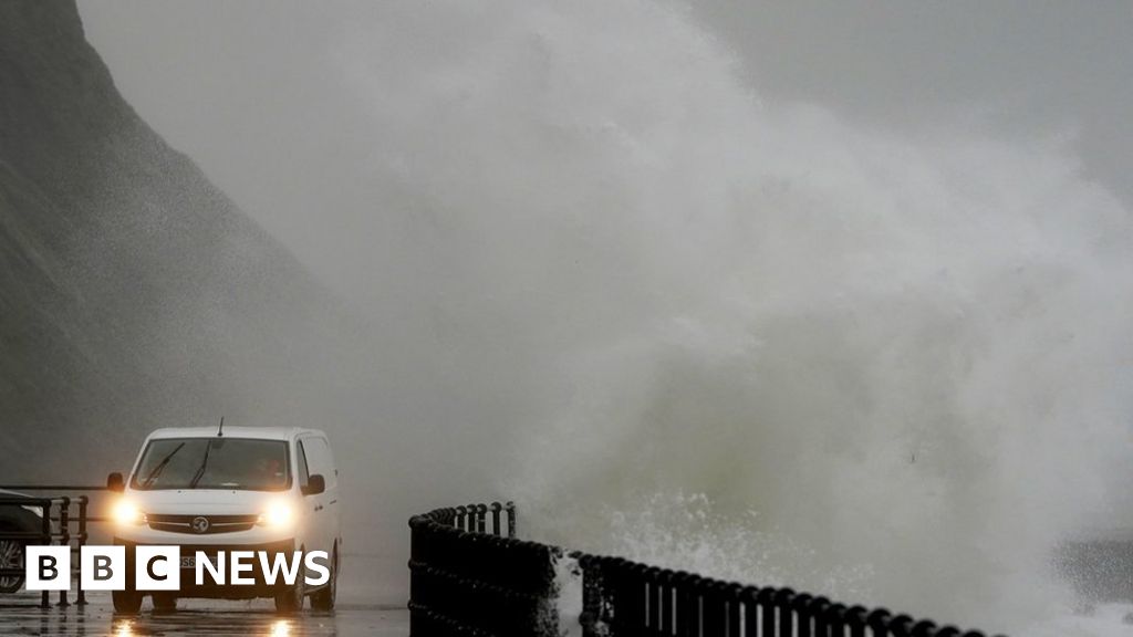 UK weather: Heavy rain prompts dozens of flood warnings