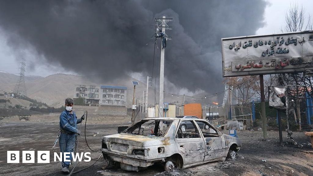 'Night turned into day': Iranians tell of strikes on oil depots