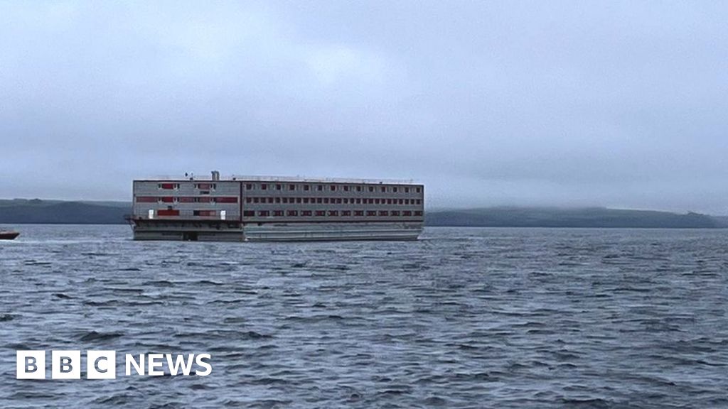 Barge for 500 migrants towed to Falmouth for refit