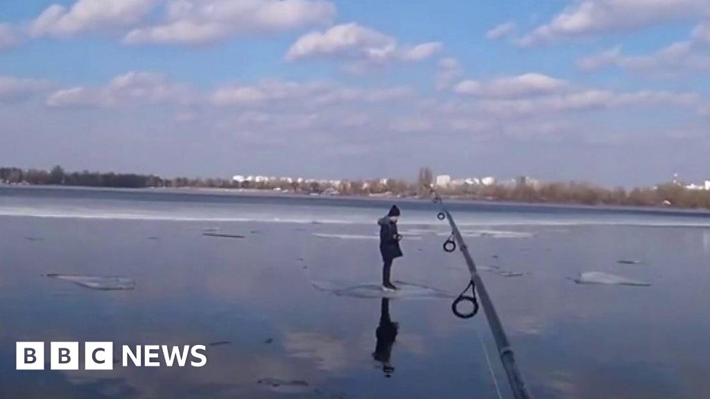 A man used a fishing pole to rescue an 11-year-old floating away on ice in  Ukraine